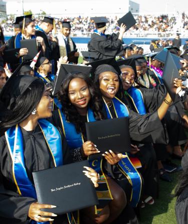 Students Celebrating at their Graduation